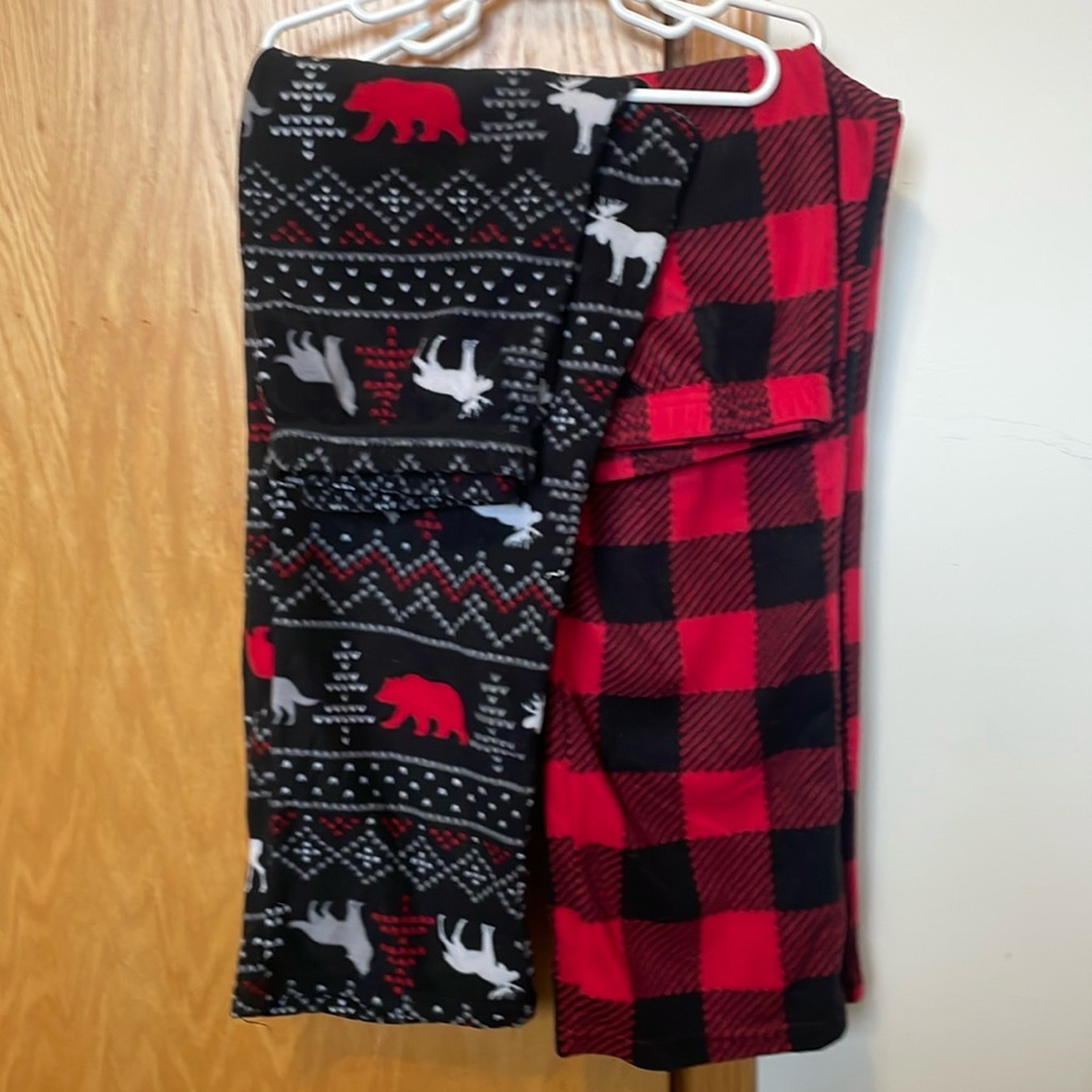 CuddlDuds 2 pc sz 10-12 pj pants. 1 pair black/red check; other is moose/bear.